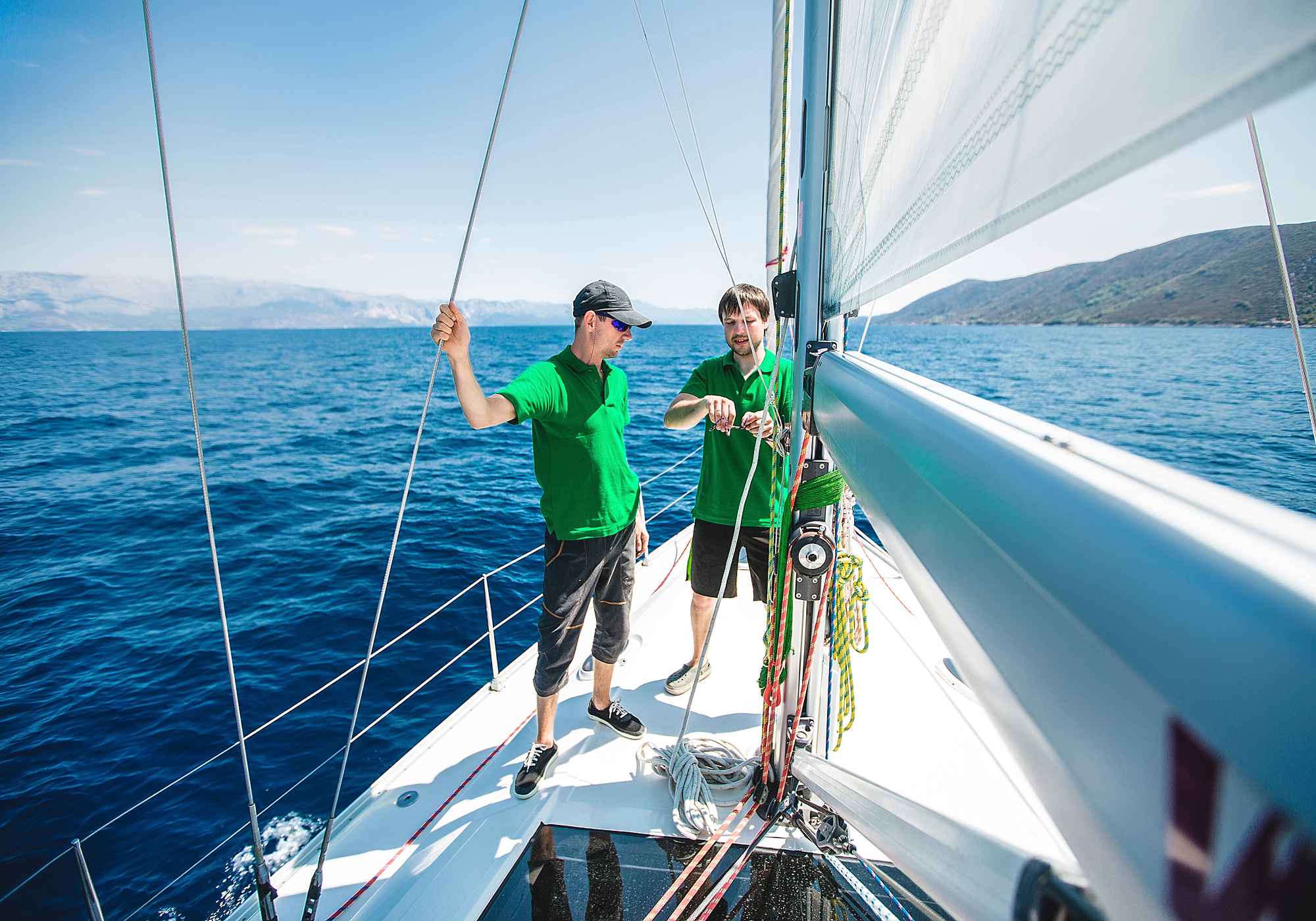 twos-men-yachting-near-coast-croatia-6JN5GRT